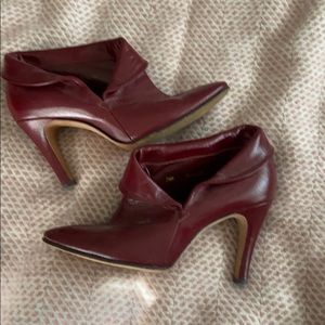 Vintage heeled red leather booties.